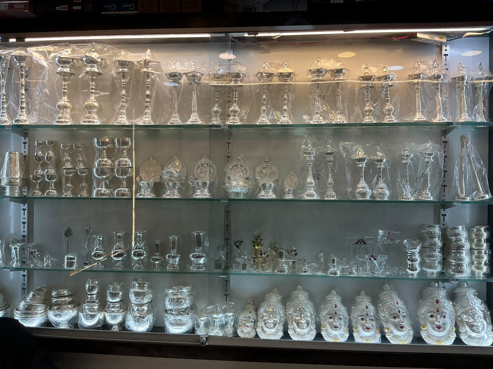 Silver articles and pooja items display